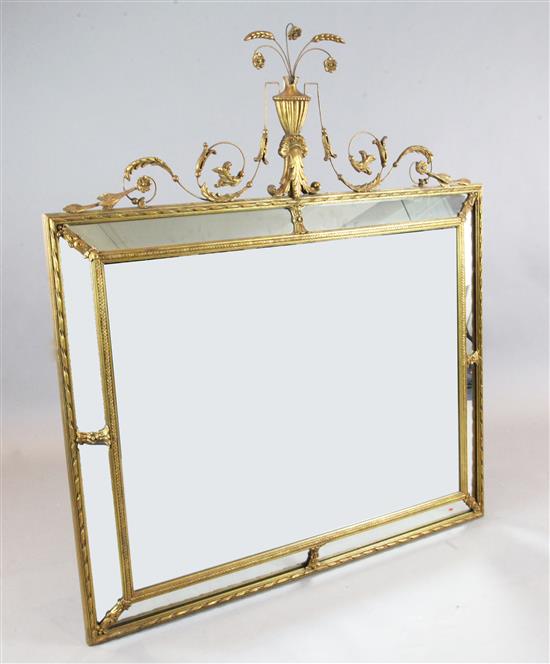 An early 20th century French gilt gesso wall mirror, W.4ft 3in. H.4ft 10in.